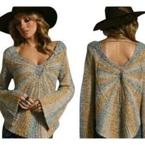 This is a Free People Pinwheel Sunburst wool-blend knit pullover sweater size L